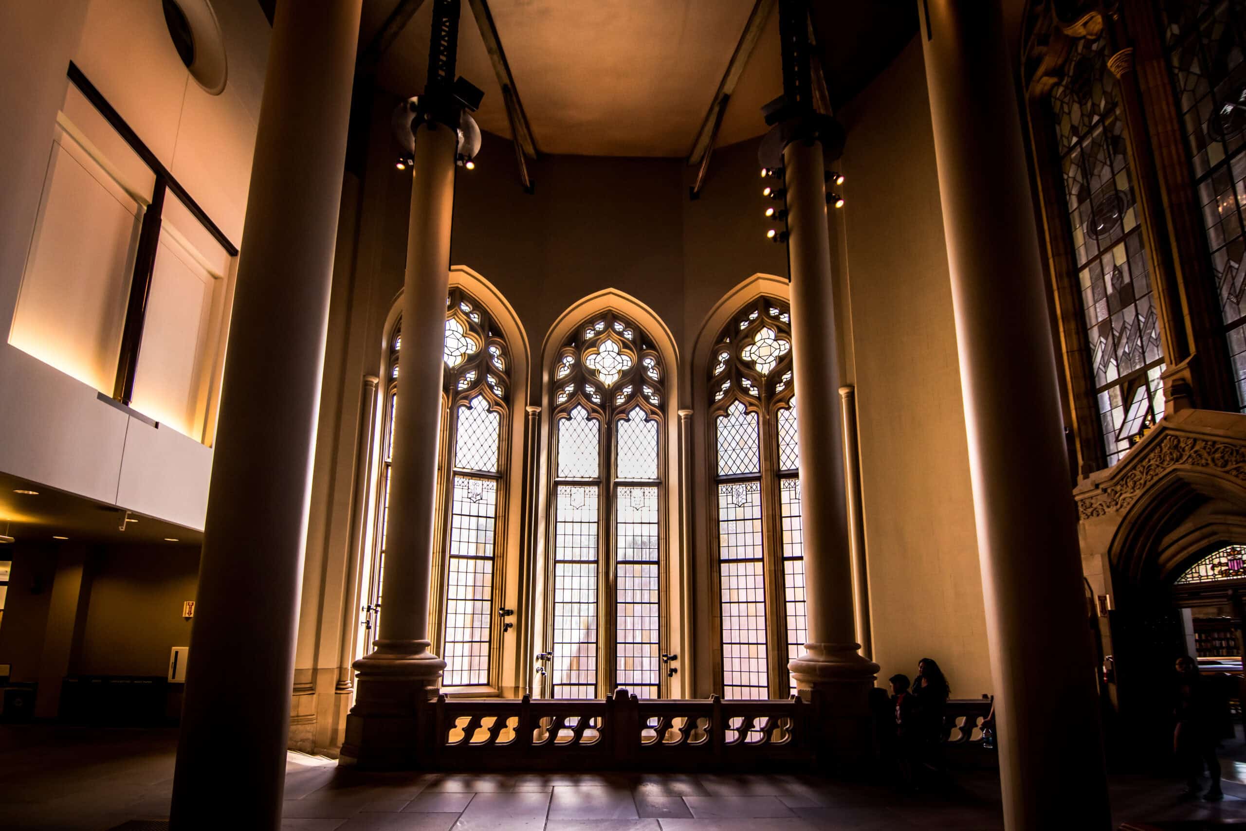 Stained glass University of Washington library windows at sunset