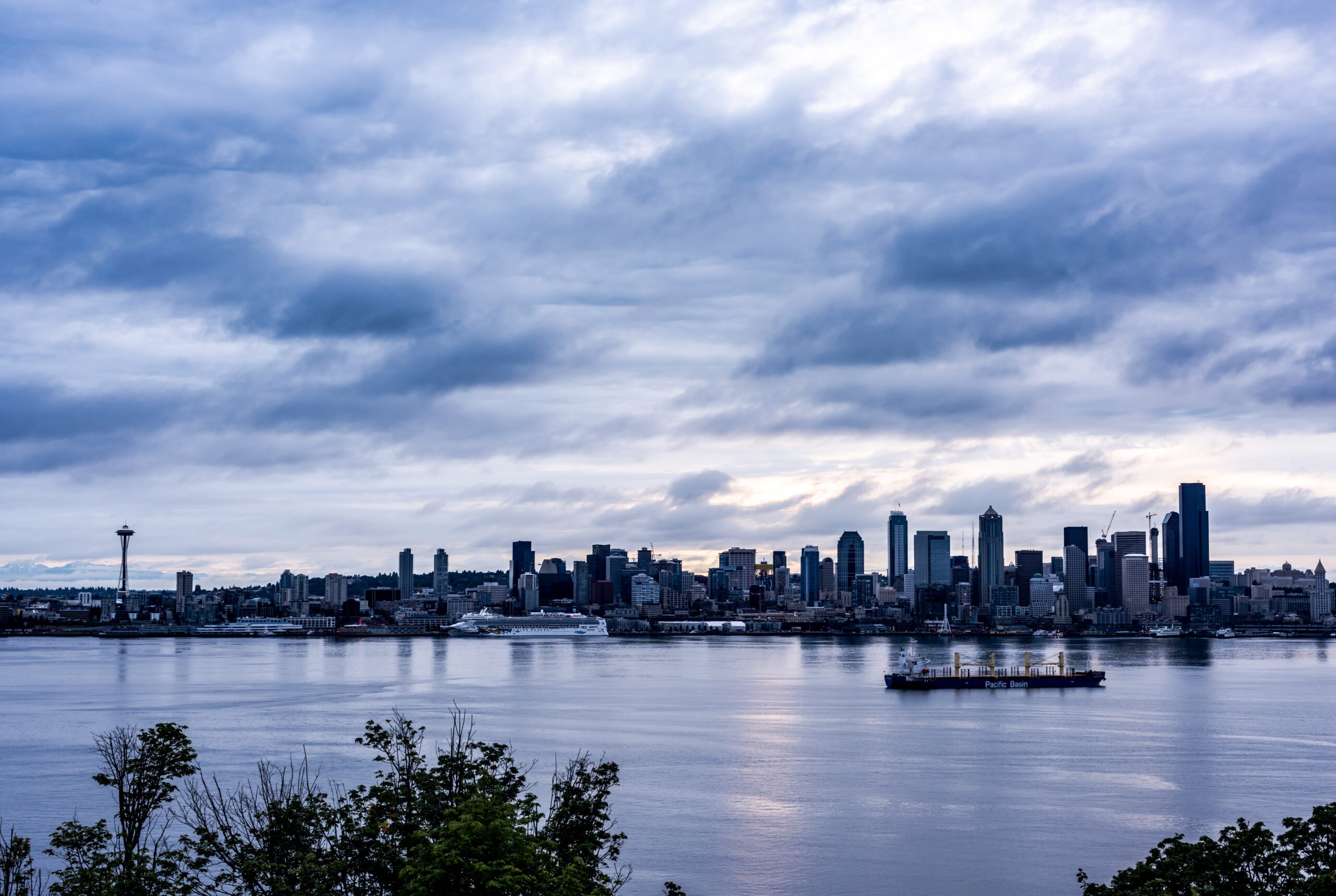 Seattle skyline sunset with Elliott Bay and Mount Rainier