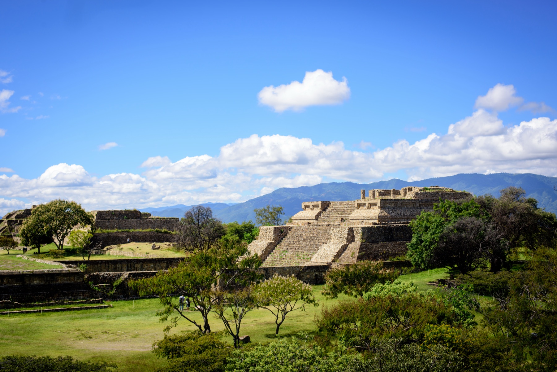 Monte Albán’s Great Plaza and pyramids seen from above, Sierra Norte behind