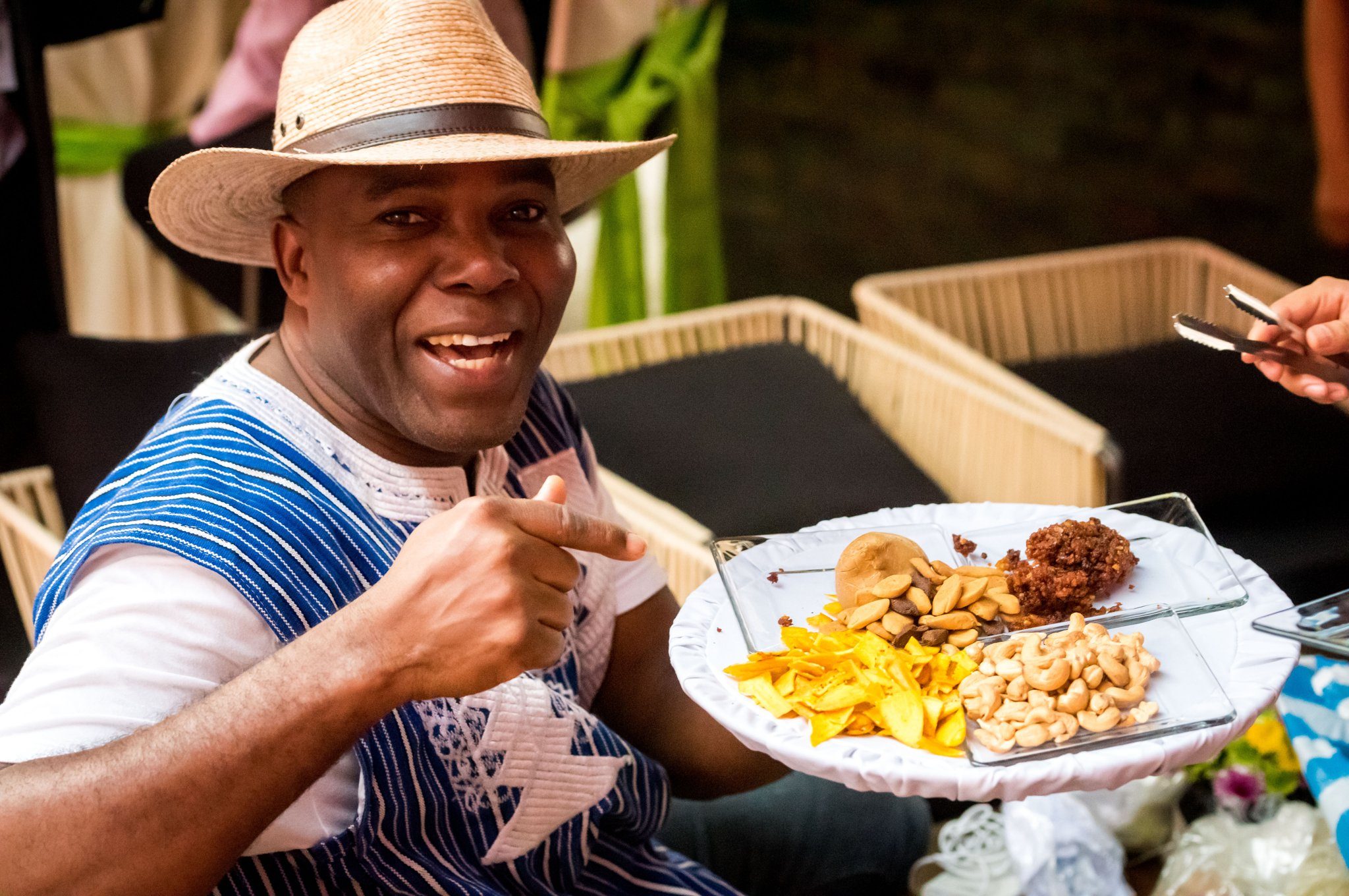 A guest grinning over lunch