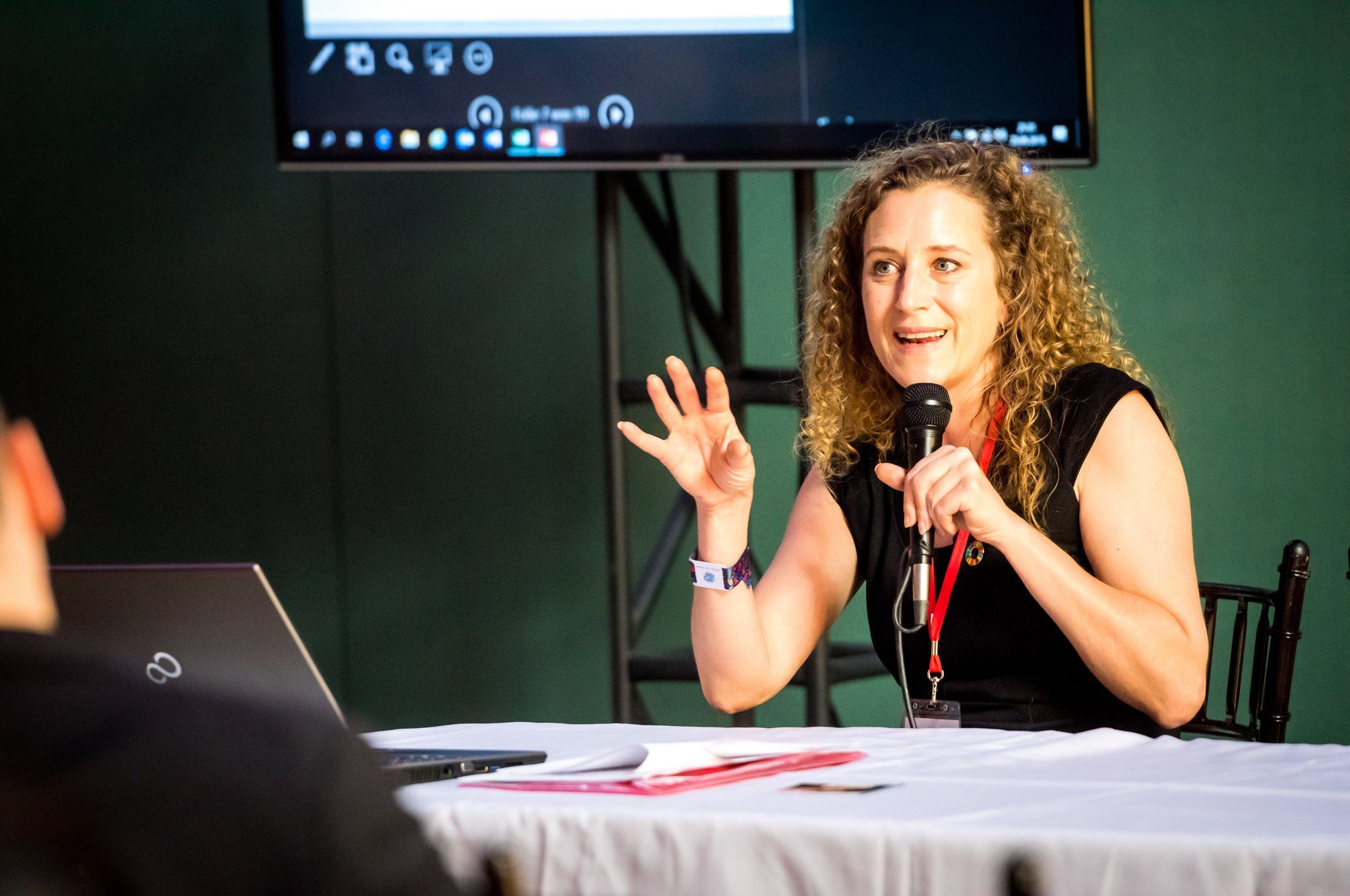 A speaker at a conference