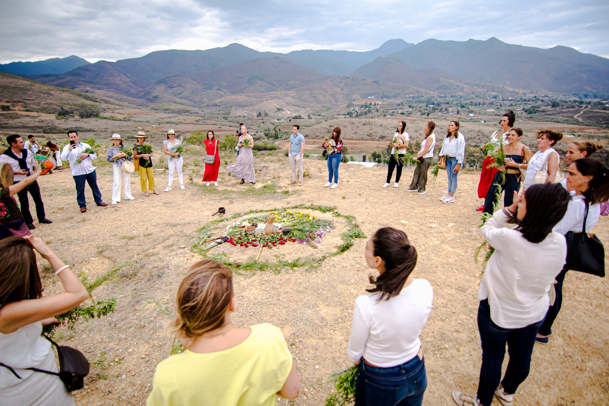 A retreat circle in a field with mountains