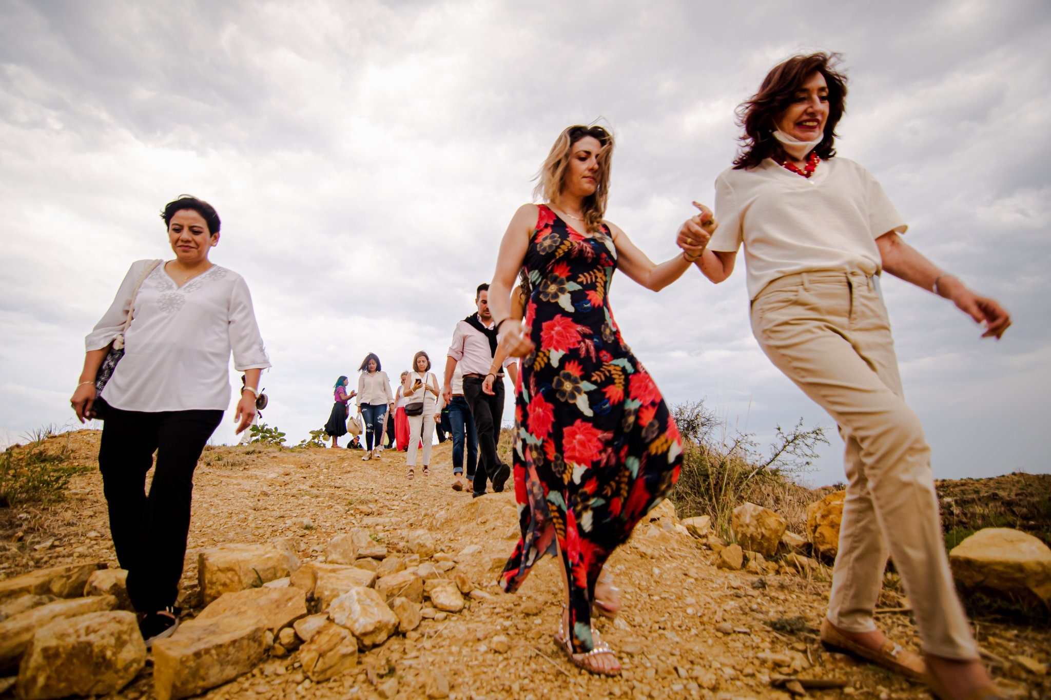 Retreat guests walking down a hill