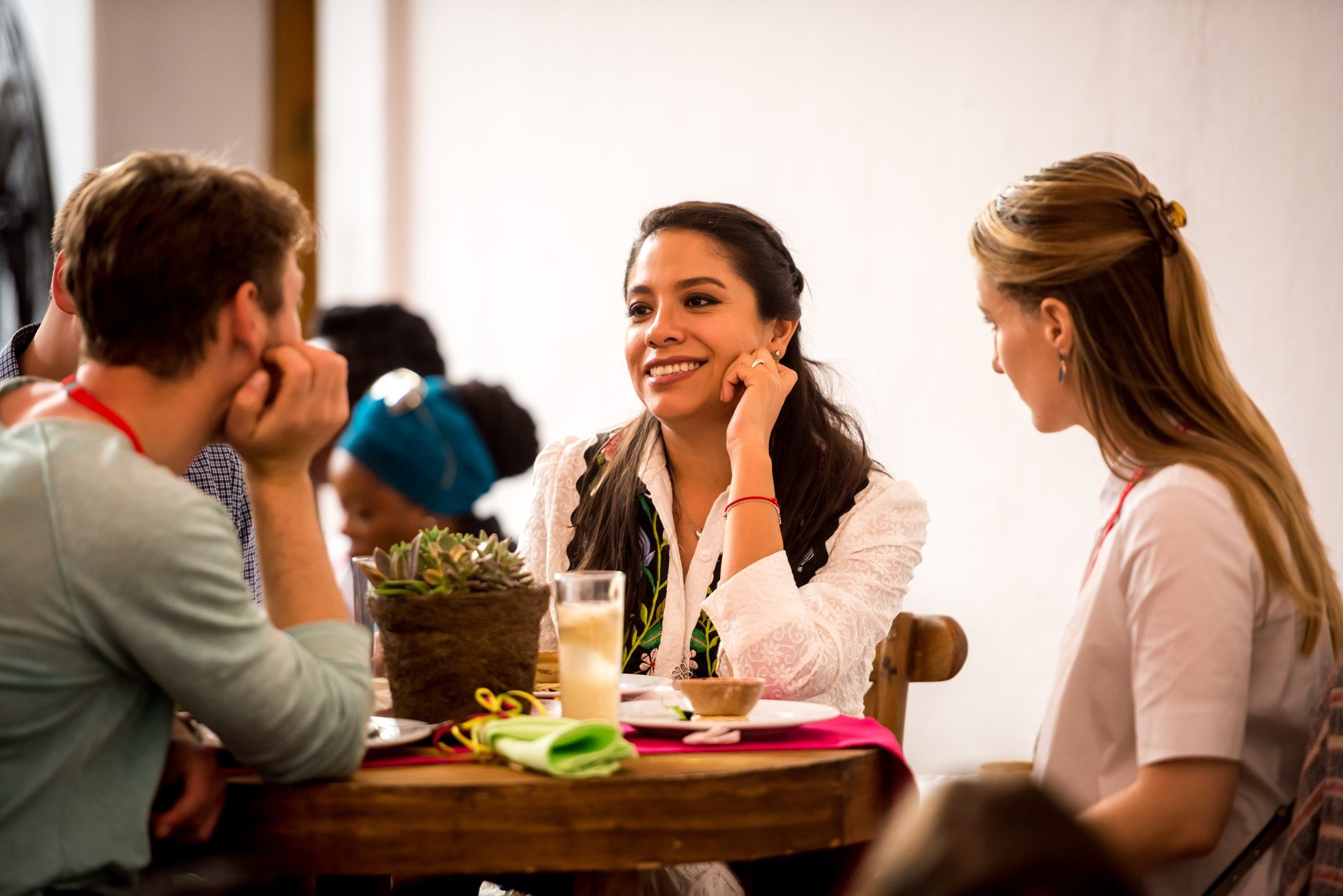 Laughing at a workshop table