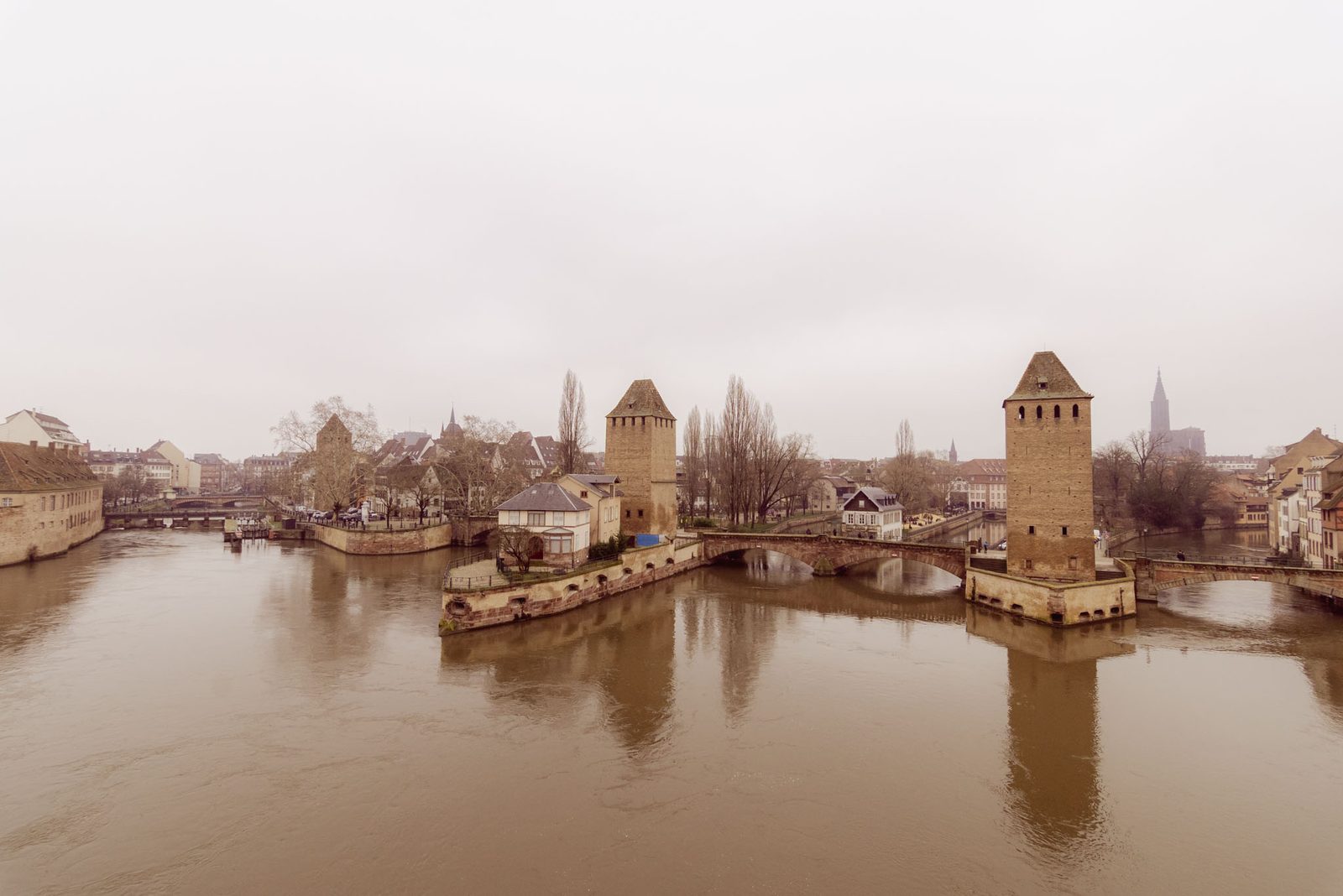 The towers of the Ponts Couverts over the Ill, seen from the Barrage Vauban